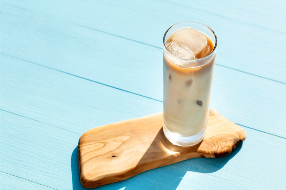 Image of iced latte on blue table